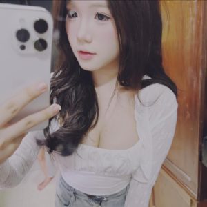 Mirror Selfie in Soft Lighting